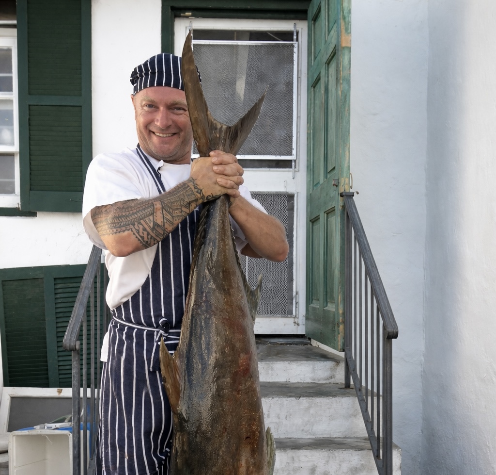 Chef Vin preparing seafood